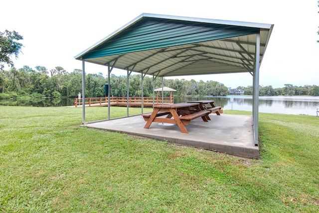 view of community featuring a gazebo, a yard, and a water view