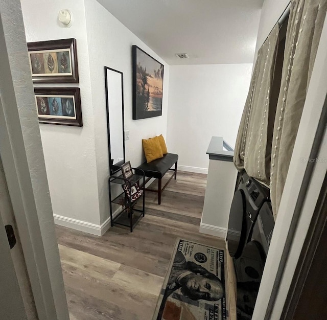 interior space with hardwood / wood-style floors