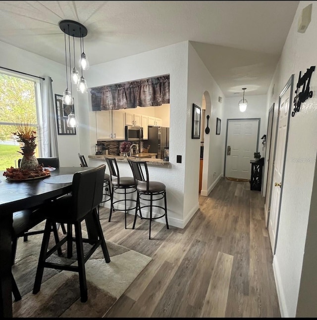 dining room featuring hardwood / wood-style floors