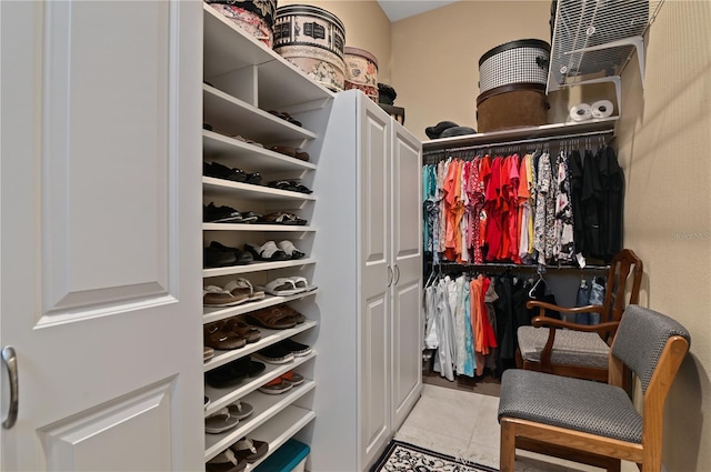 walk in closet featuring light tile patterned floors