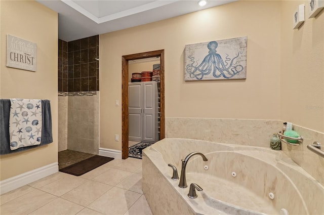 bathroom featuring tile patterned flooring and shower with separate bathtub