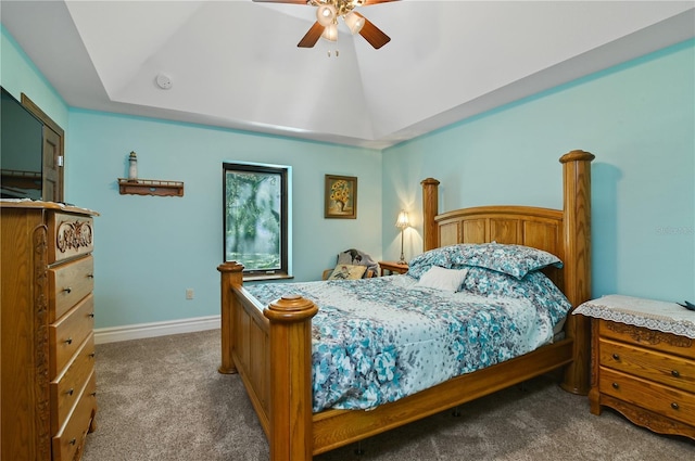 bedroom with ceiling fan, carpet, and vaulted ceiling