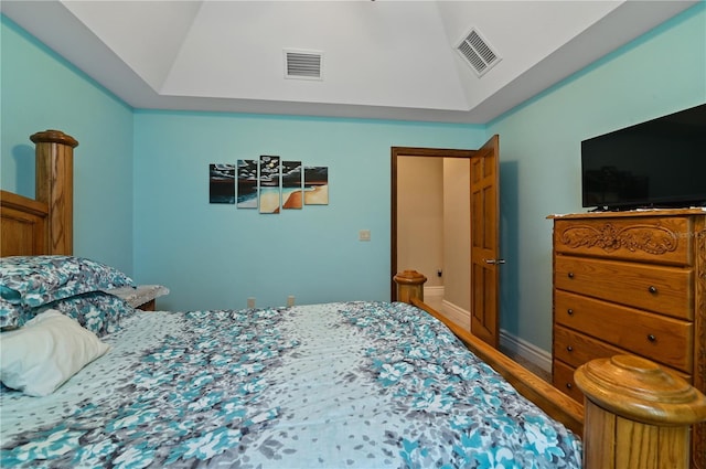 bedroom with a raised ceiling