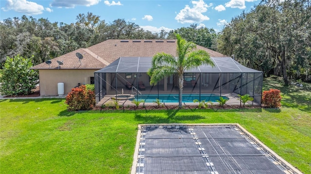 exterior space featuring a lanai and a yard