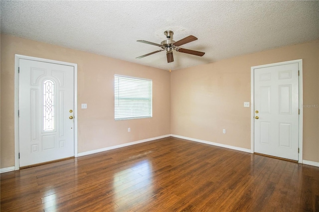 3933 Strickland Ct, Lakeland, FL 33812 - entryway featuring a ceiling fan, wood finished floors, baseboards, and a textured ceiling