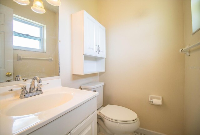 3933 Strickland Ct, Lakeland, FL 33812 - bathroom featuring toilet and vanity