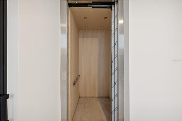 bathroom with wood finished floors