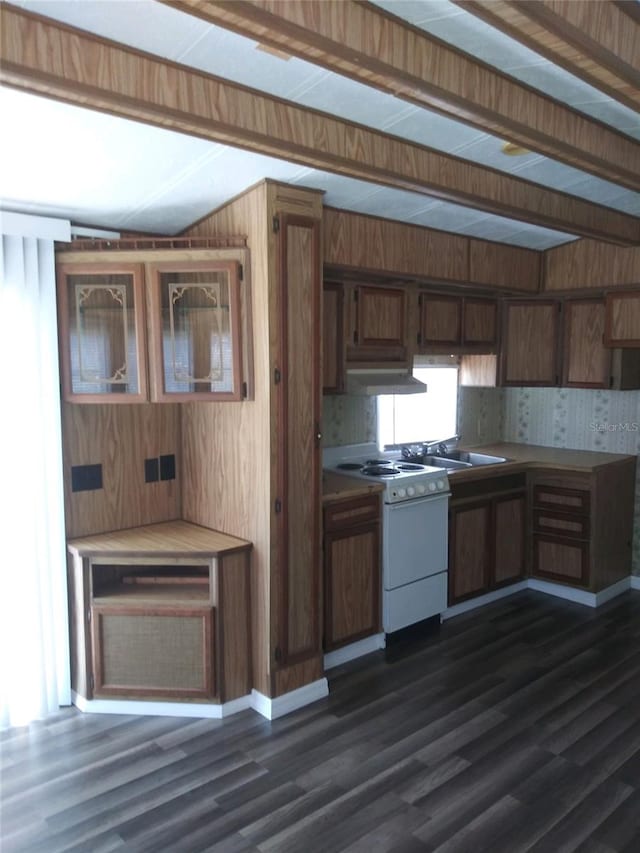 kitchen featuring under cabinet range hood, light countertops, white electric range, and dark wood finished floors