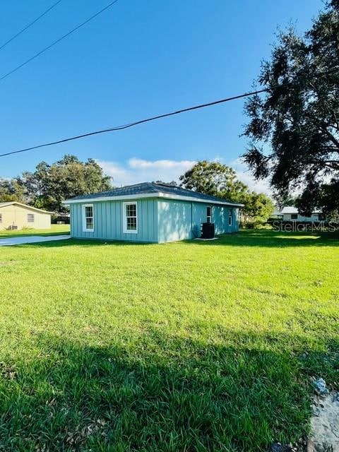 exterior space with a yard