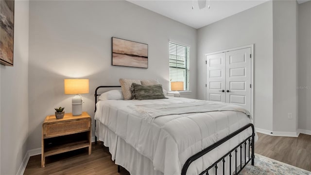 bedroom featuring a closet and hardwood / wood-style flooring