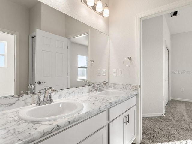 bathroom featuring vanity