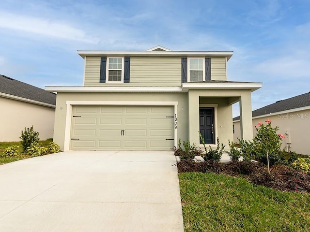 view of front property with a garage