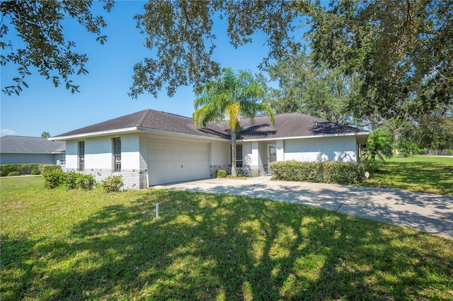 ranch-style home with a front lawn and a garage