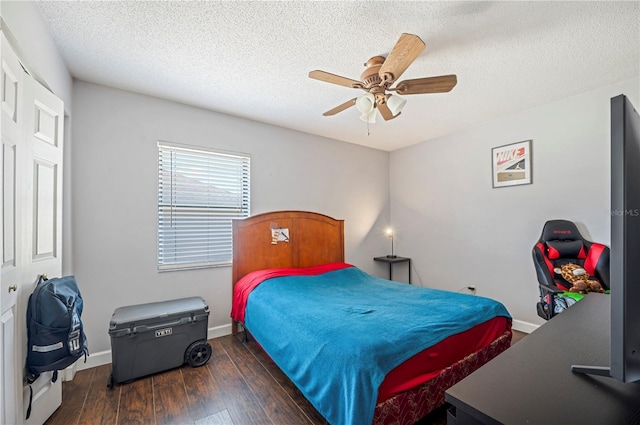 941 Devonshire Way, Lake Wales, FL 33853 - bedroom with hardwood / wood-style floors, ceiling fan, a textured ceiling, and baseboards
