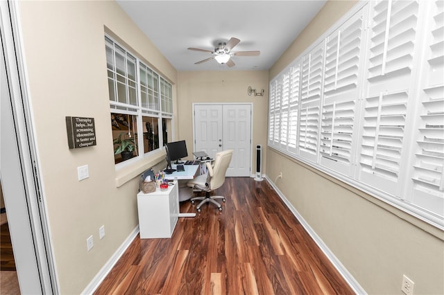 office space featuring wood finished floors, baseboards, and ceiling fan