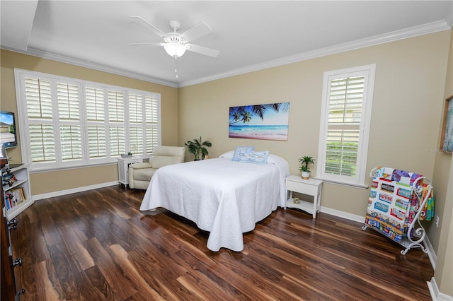 bedroom featuring ornamental molding, dark wood-type flooring, and ceiling fan