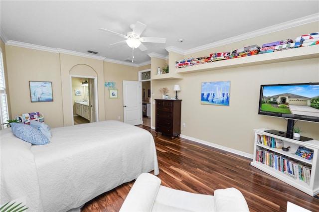 bedroom featuring dark hardwood / wood-style flooring, ornamental molding, connected bathroom, and ceiling fan