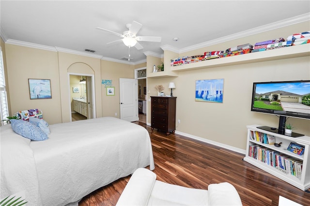 bedroom featuring crown molding, ensuite bathroom, dark wood finished floors, baseboards, and visible vents
