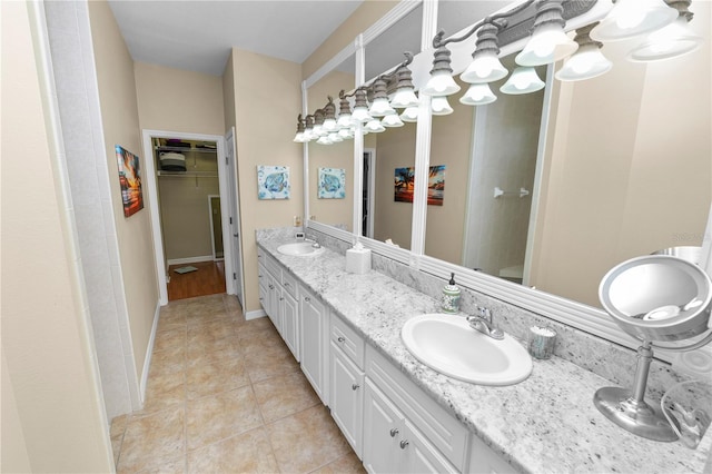 bathroom with vanity and tile patterned flooring