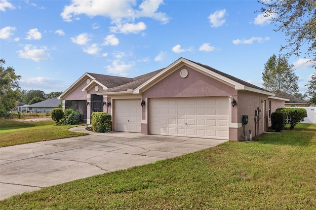 ranch-style home with a front yard and a garage