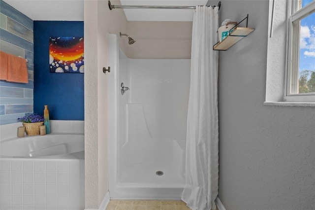 bathroom featuring plus walk in shower