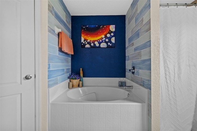 bathroom featuring a relaxing tiled tub