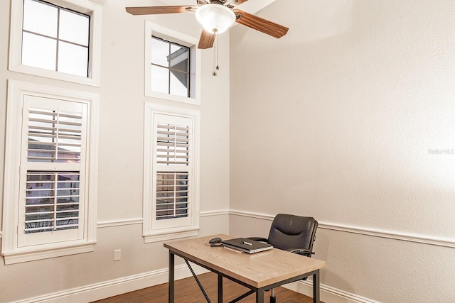 office area with hardwood / wood-style floors and ceiling fan