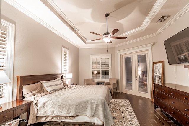 bedroom featuring french doors, ornamental molding, access to exterior, dark hardwood / wood-style flooring, and ceiling fan