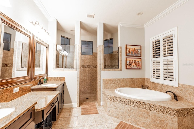 bathroom with vanity, tile patterned floors, ornamental molding, and separate shower and tub