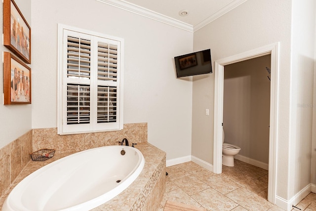 bathroom featuring tiled bath, toilet, and crown molding