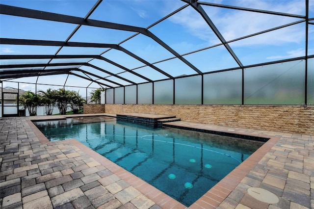 5074 Shore Side Dr, Lakeland, FL 33812 - outdoor pool with a lanai, a patio, and a jacuzzi
