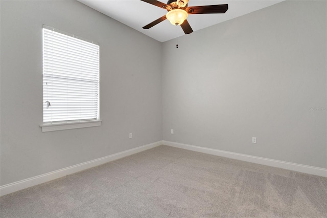 5074 Shore Side Dr, Lakeland, FL 33812 - spare room with a ceiling fan, light colored carpet, baseboards, and lofted ceiling