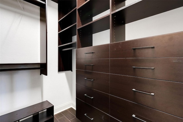 5074 Shore Side Dr, Lakeland, FL 33812 - walk in closet featuring dark wood-style flooring