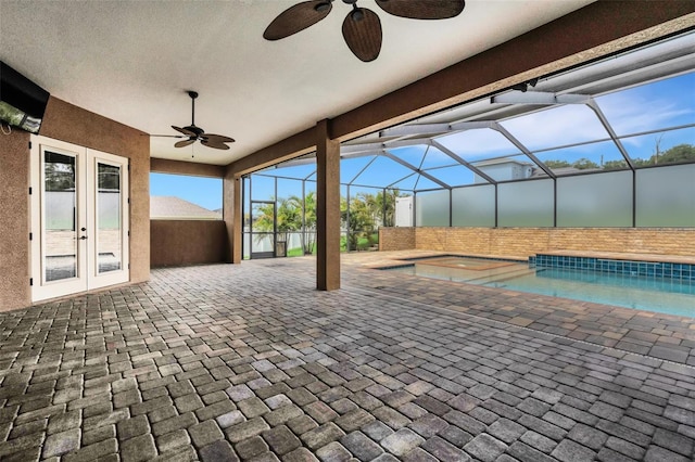 5074 Shore Side Dr, Lakeland, FL 33812 - view of patio with a ceiling fan, french doors, a pool with connected hot tub, and a lanai