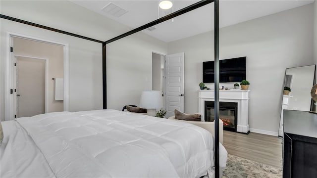 bedroom featuring light hardwood / wood-style flooring