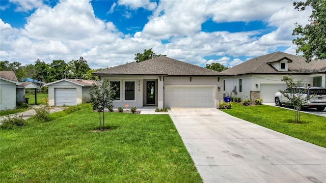 view of front facade featuring a front lawn and a garage