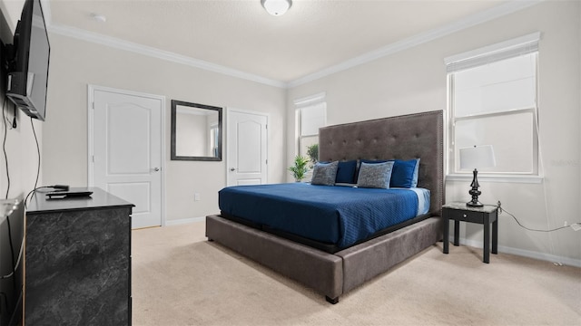 carpeted bedroom with ornamental molding