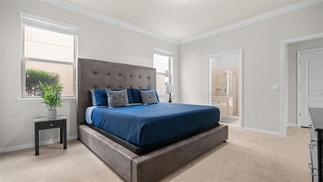 carpeted bedroom with crown molding and connected bathroom