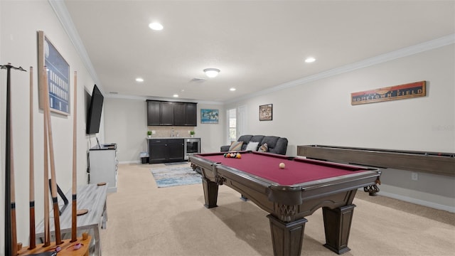 rec room featuring wet bar, light carpet, crown molding, and pool table