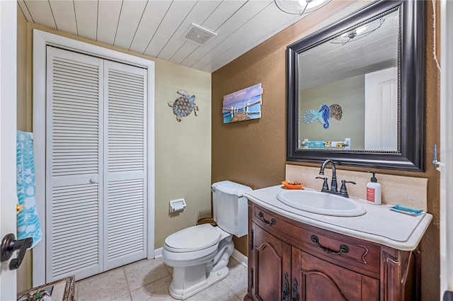 bathroom featuring vanity, tile patterned floors, wooden ceiling, and toilet