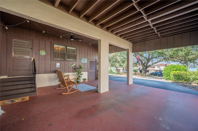 view of patio featuring ceiling fan