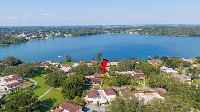 birds eye view of property featuring a water view and a residential view