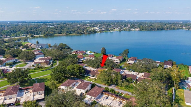 aerial view with a residential view and a water view