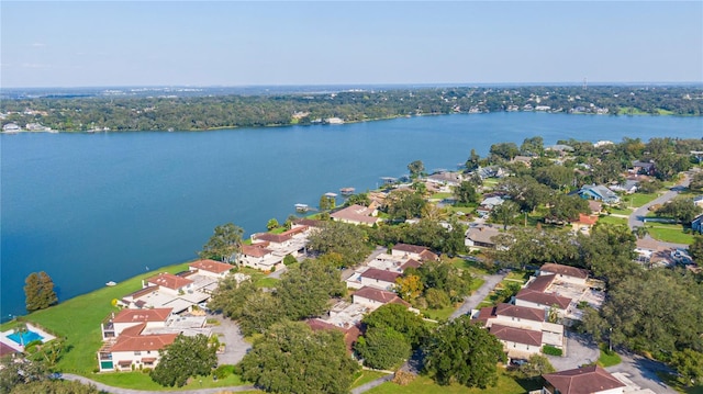 birds eye view of property with a residential view and a water view