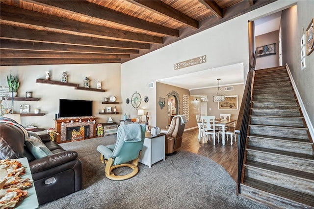 living room featuring wood ceiling, beam ceiling, and dark hardwood / wood-style flooring