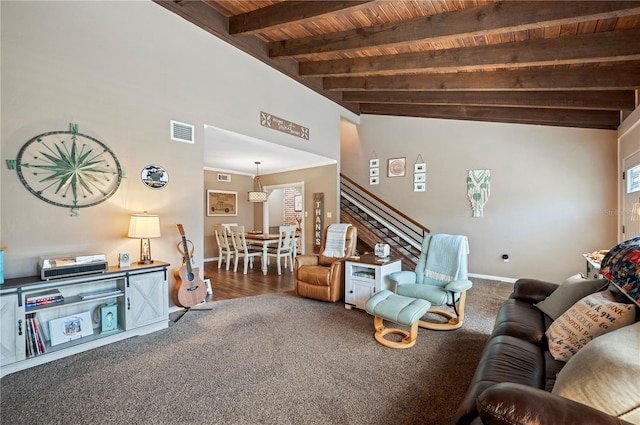 living room featuring carpet flooring, vaulted ceiling with beams, and wooden ceiling