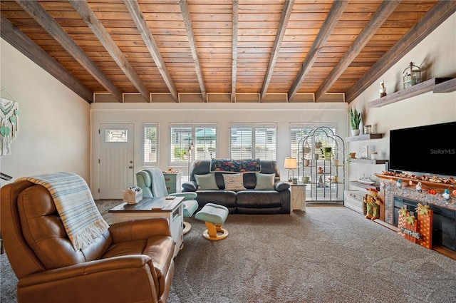 carpeted living room with vaulted ceiling with beams and wood ceiling