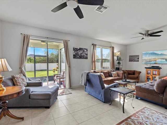 living room with light tile patterned flooring