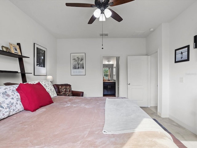 carpeted bedroom with ceiling fan and connected bathroom