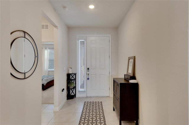 view of tiled foyer entrance